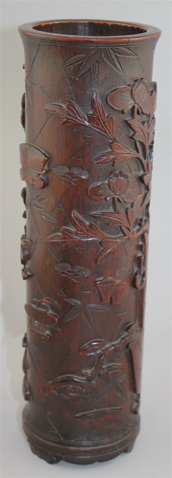 A Chinese bamboo hundred antiques cylindrical brush pot, 19th century, 34cm